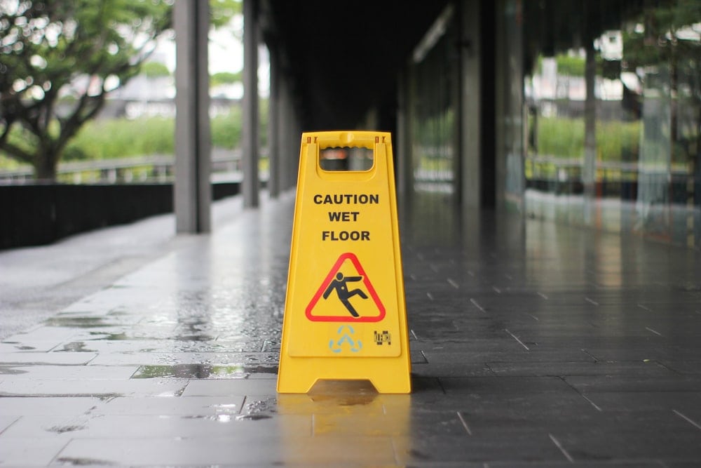 Slip and Fall Warning Sign on Wet Floor