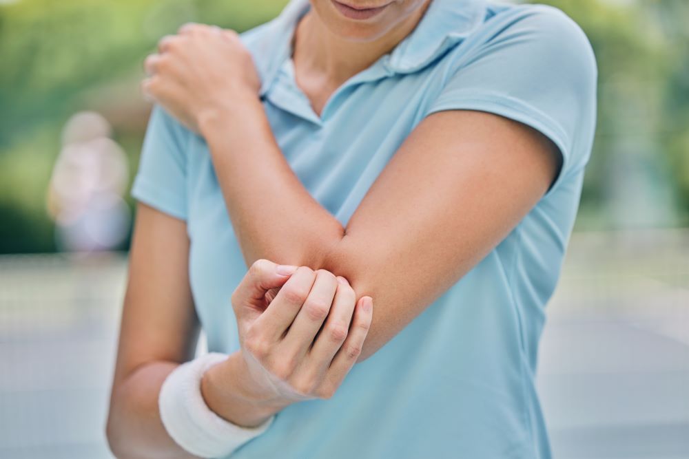 average settlement for elbow injury