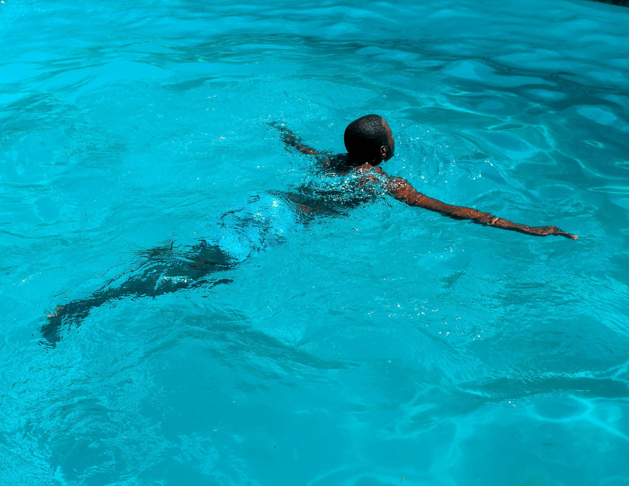 A serene swimming pool, often the place where tragic drowning accidents occur.